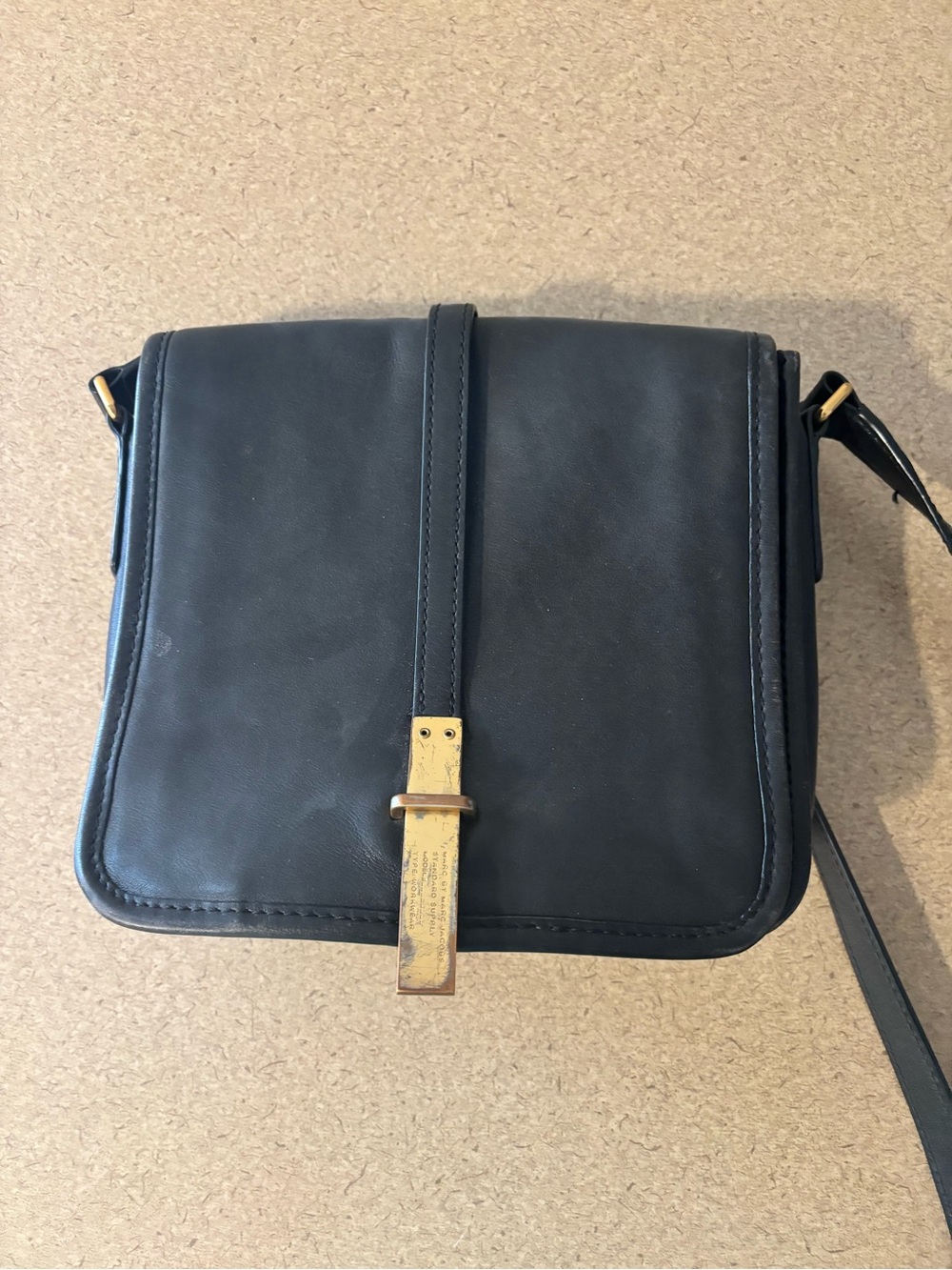 Black Leather Crossbody Bag with Gold Accent
